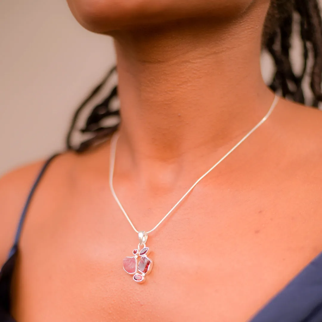 African Garnet and Brazilian Tourmaline Pendant - Vibrant Richness, Global Elegance