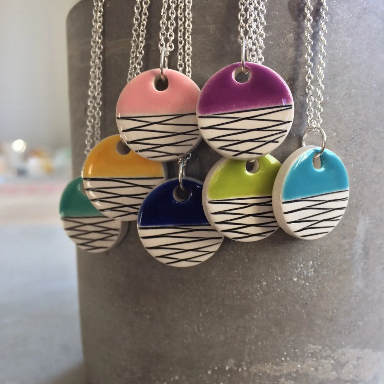 Colourful minimalist geometric ceramic pendants