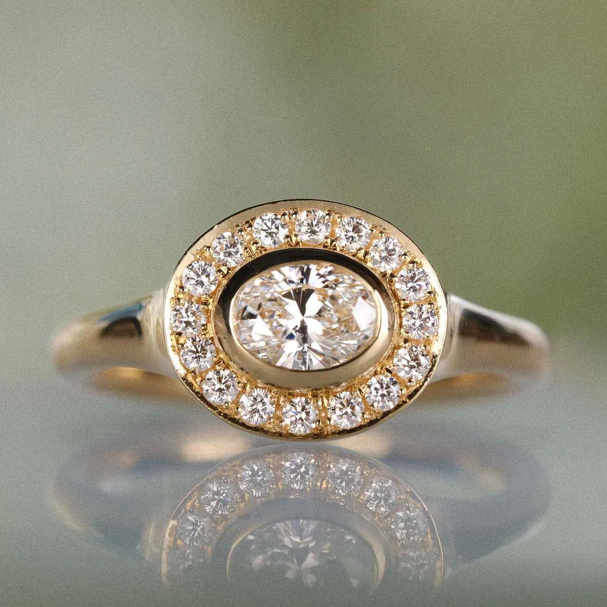 FRAME Oval Diamond Gold Ring with Diamond Halo