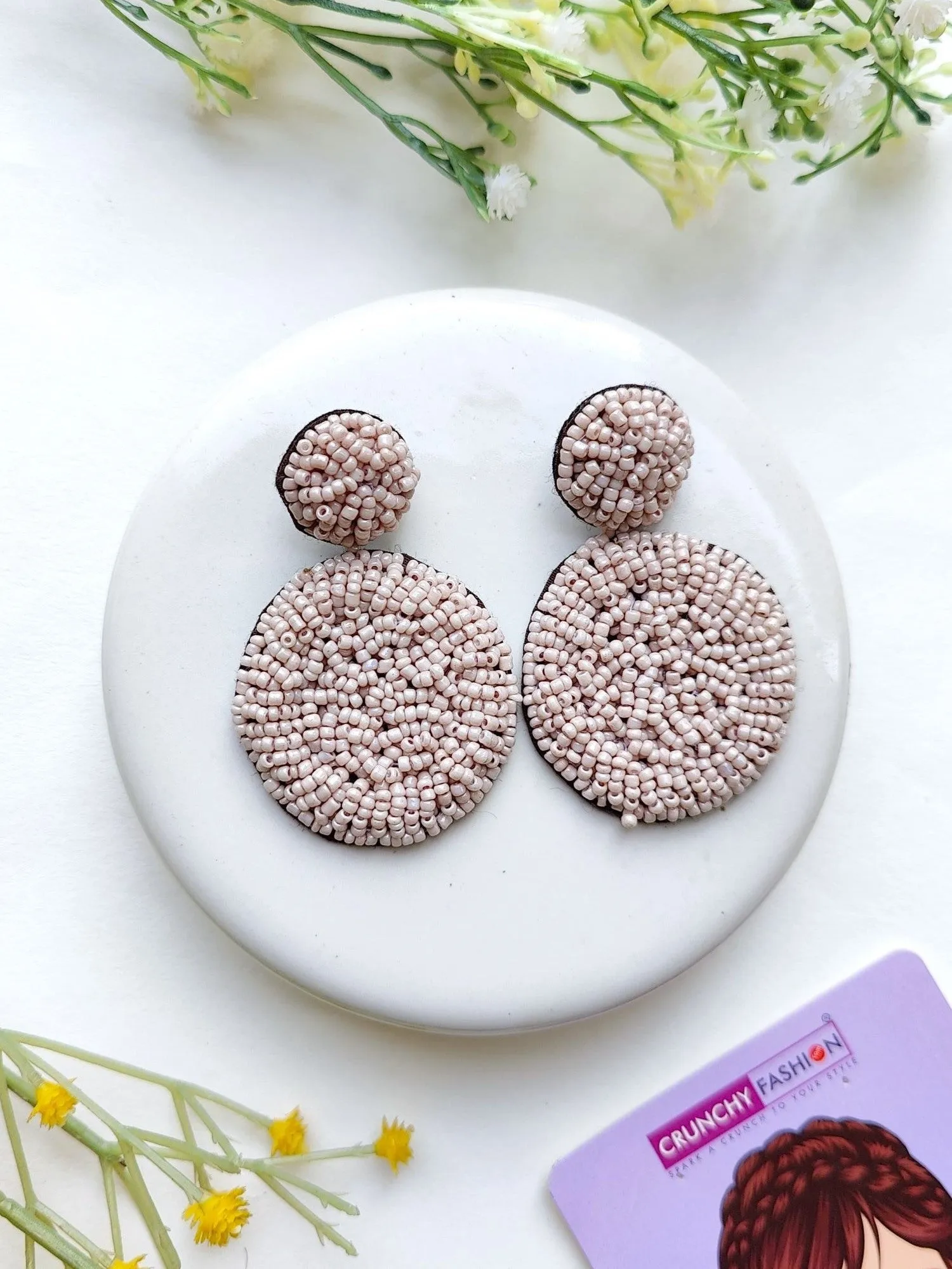 Handcrafted Sky Blue Beaded Danglers: A Fashionista's Statement Earrings